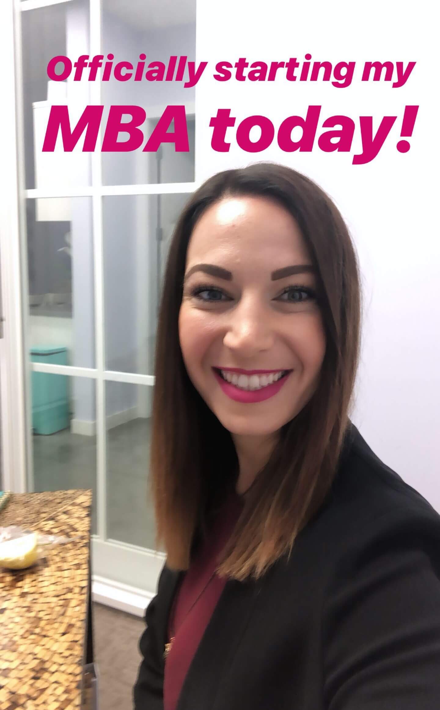Screenshot from Brittany's social media post of her in her house with text saying Officially starting my MBA today!