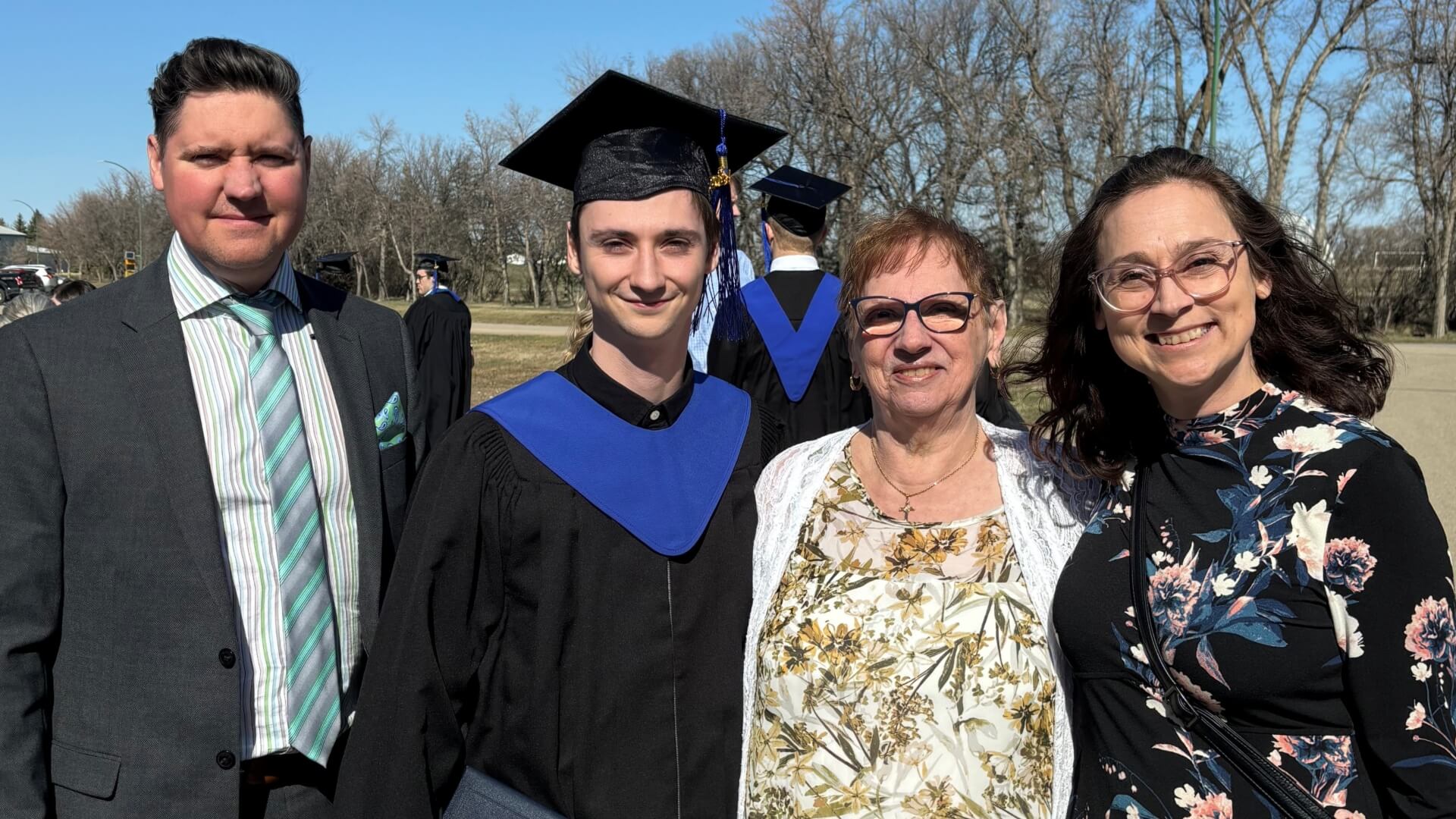 Carrie Bueckert at her son's convocation with husband and mom Carrie Bueckert at her son's convocation with husband and mom