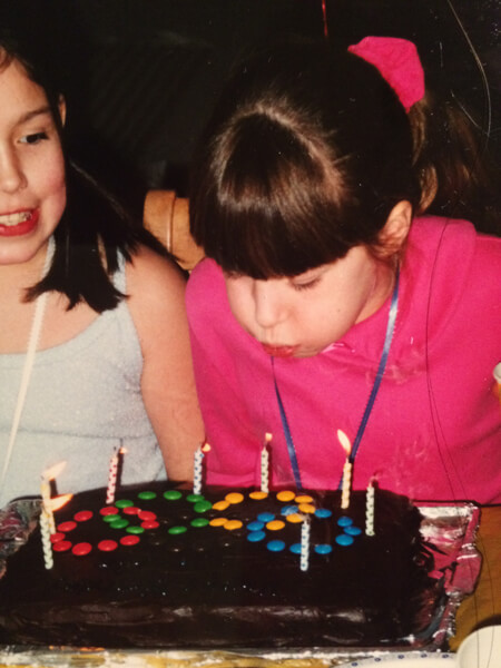 Dahria Beatty blows out birthday cake