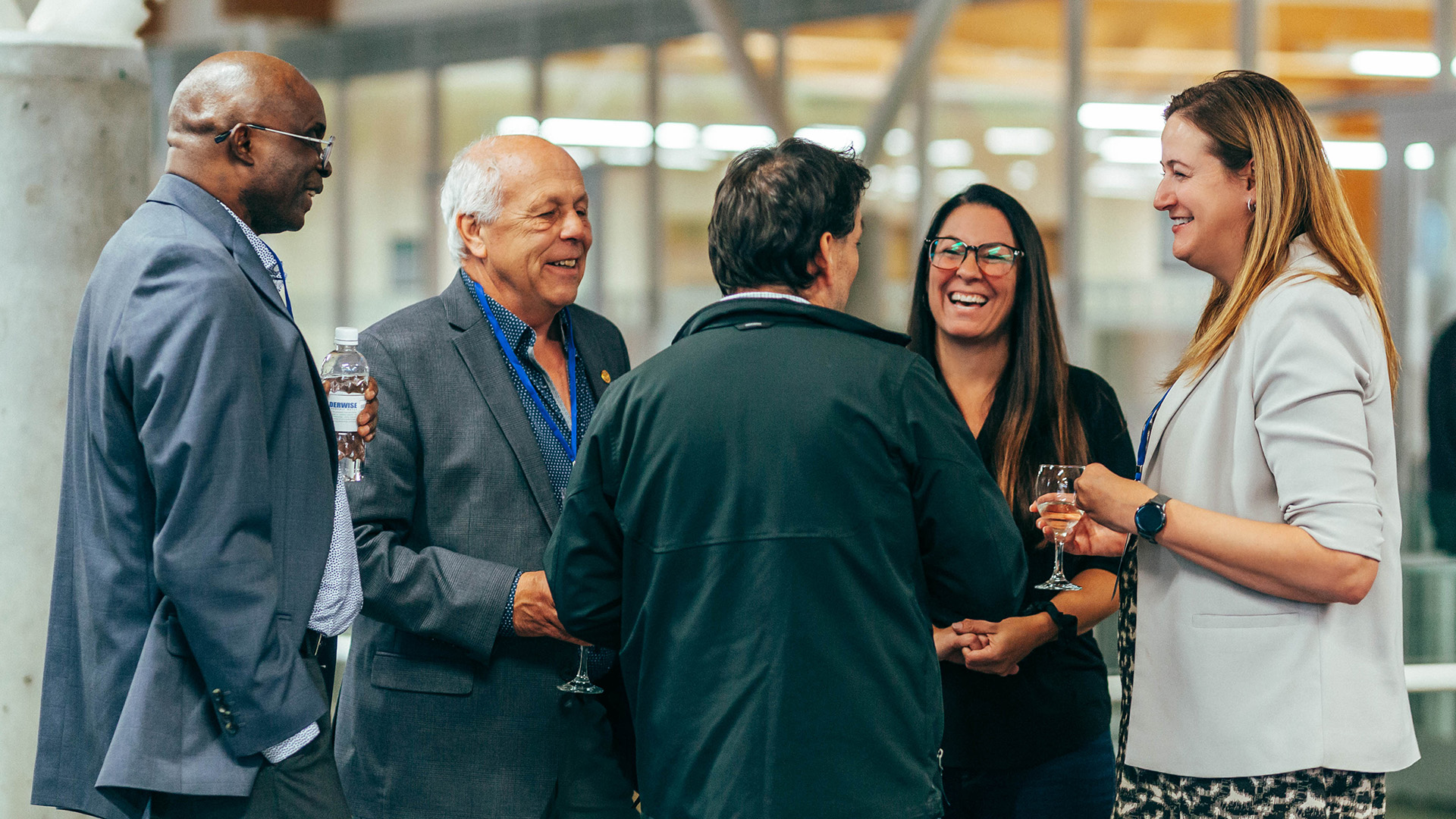 Athabasca Mayor Rob Balay chats with AU staff at Friday evening mixer