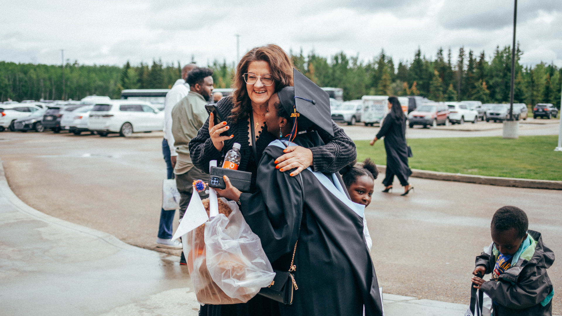Grad celebrating with family