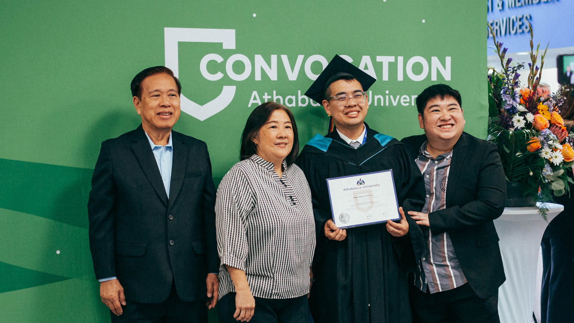 Grad celebrating with family