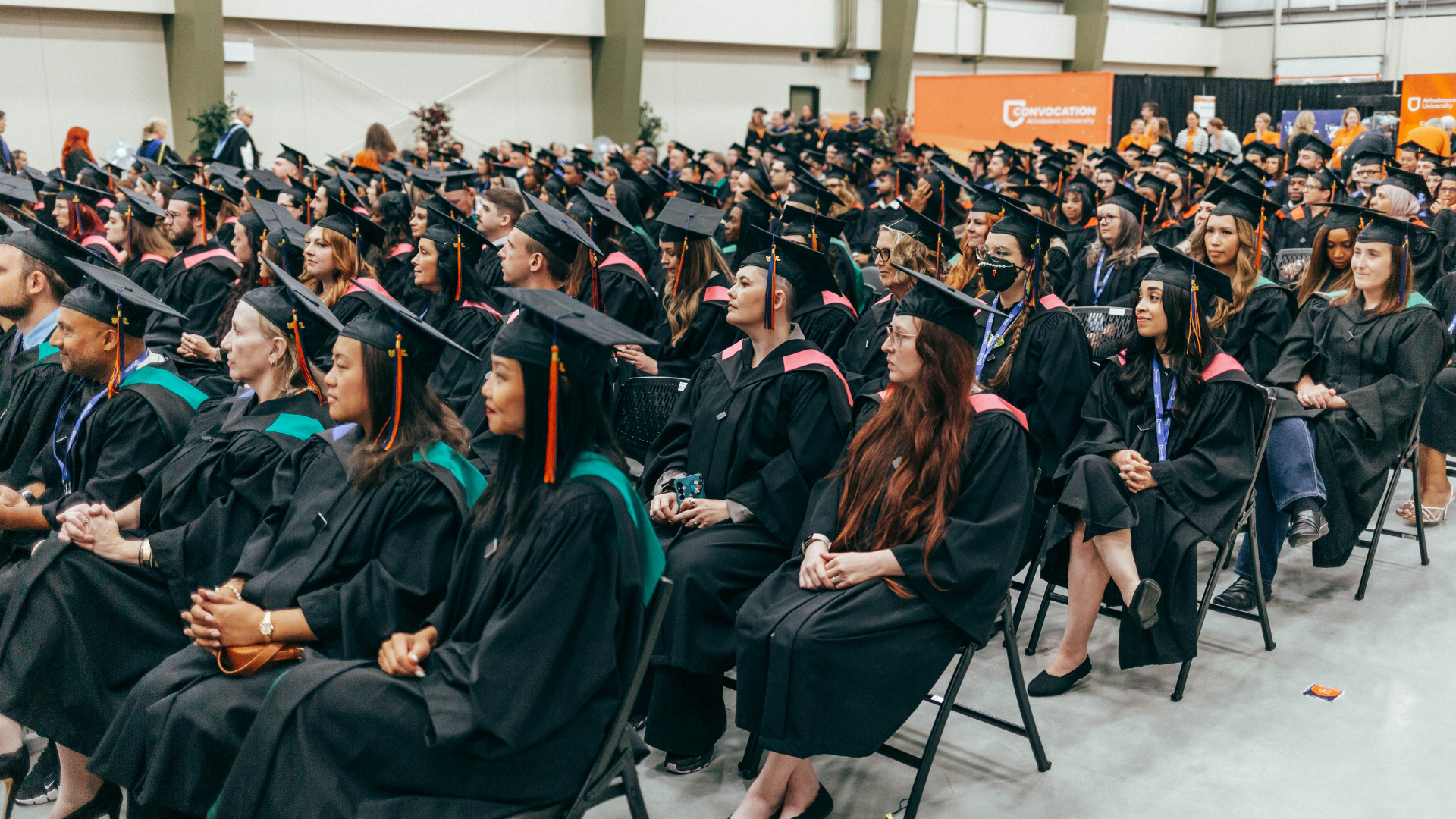 Grads sitting in rows
