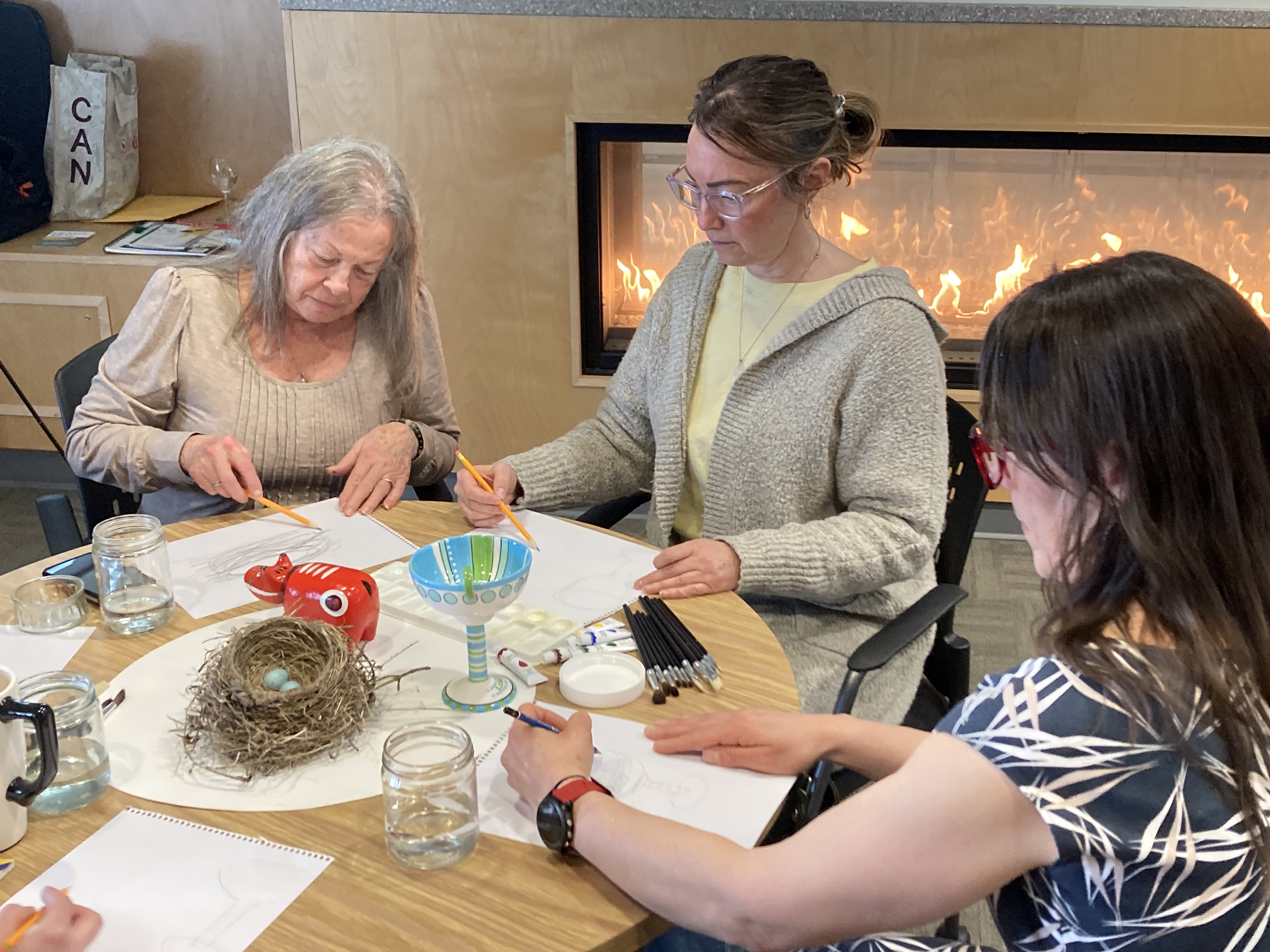 A group working on their watercolour art