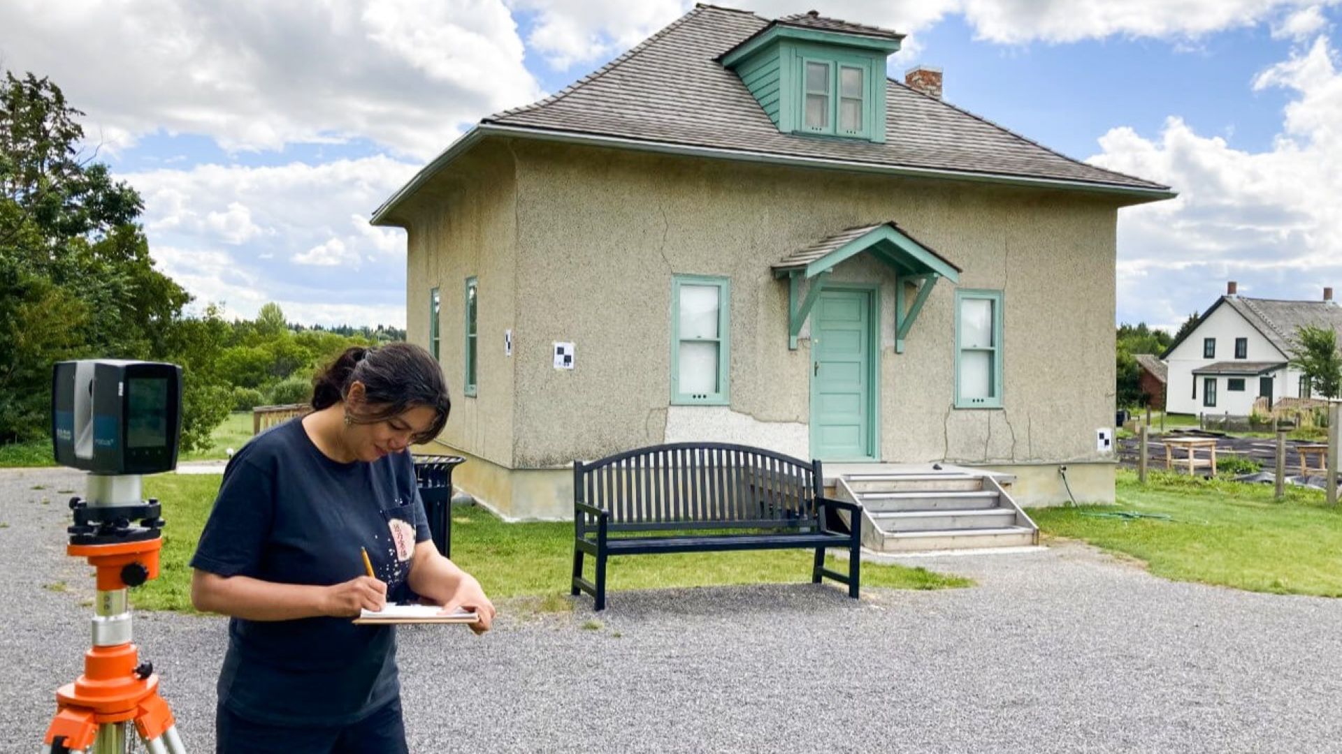 Dr. Shabnam Inanloo Dailoo documenting the Cunningham House in St. Albert, Alta.