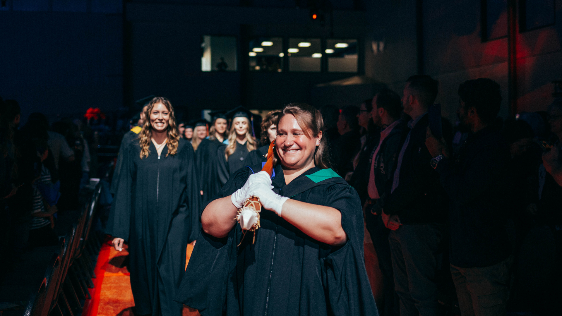 Registrar Angela Kuzyk leads the convocation procession into Convocation 2026