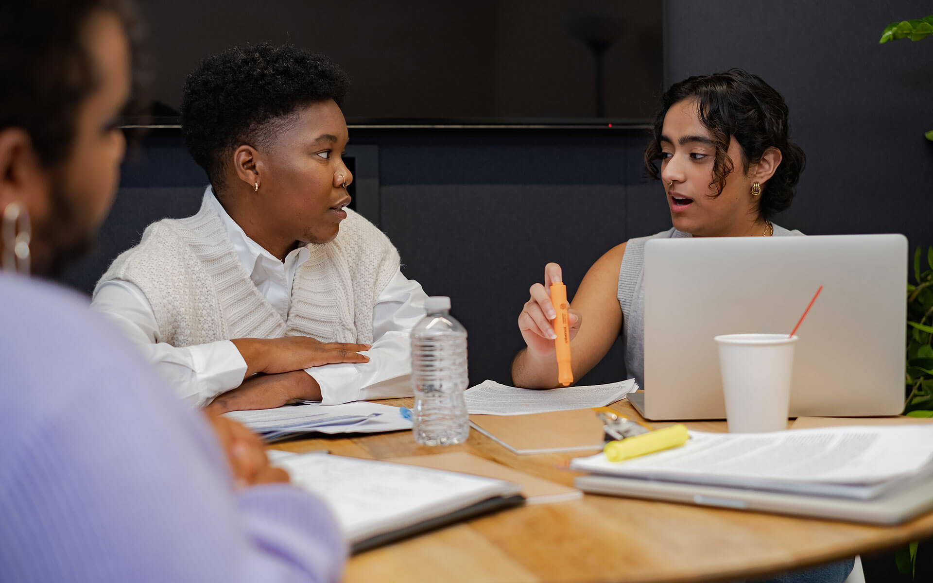 meeting-diversity-1920-1200 a trans person and a trans man talking at a work meeting