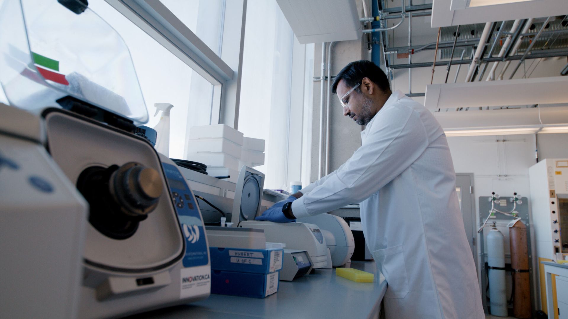 Dr. Srijak Bhatnagar working in his Calgary laboratory