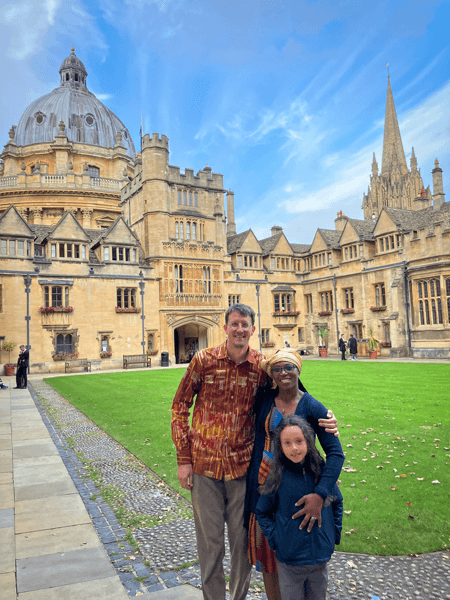 Dr. Veronica Fynn Bruey with her husband and child