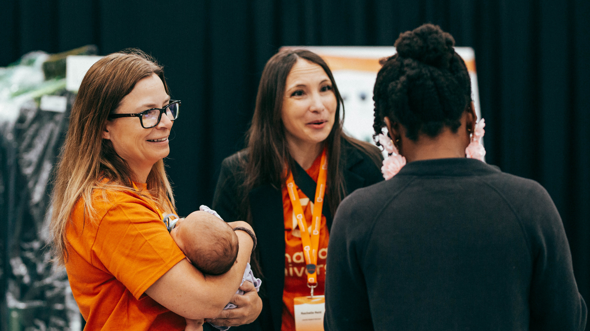 Volunteer holding baby