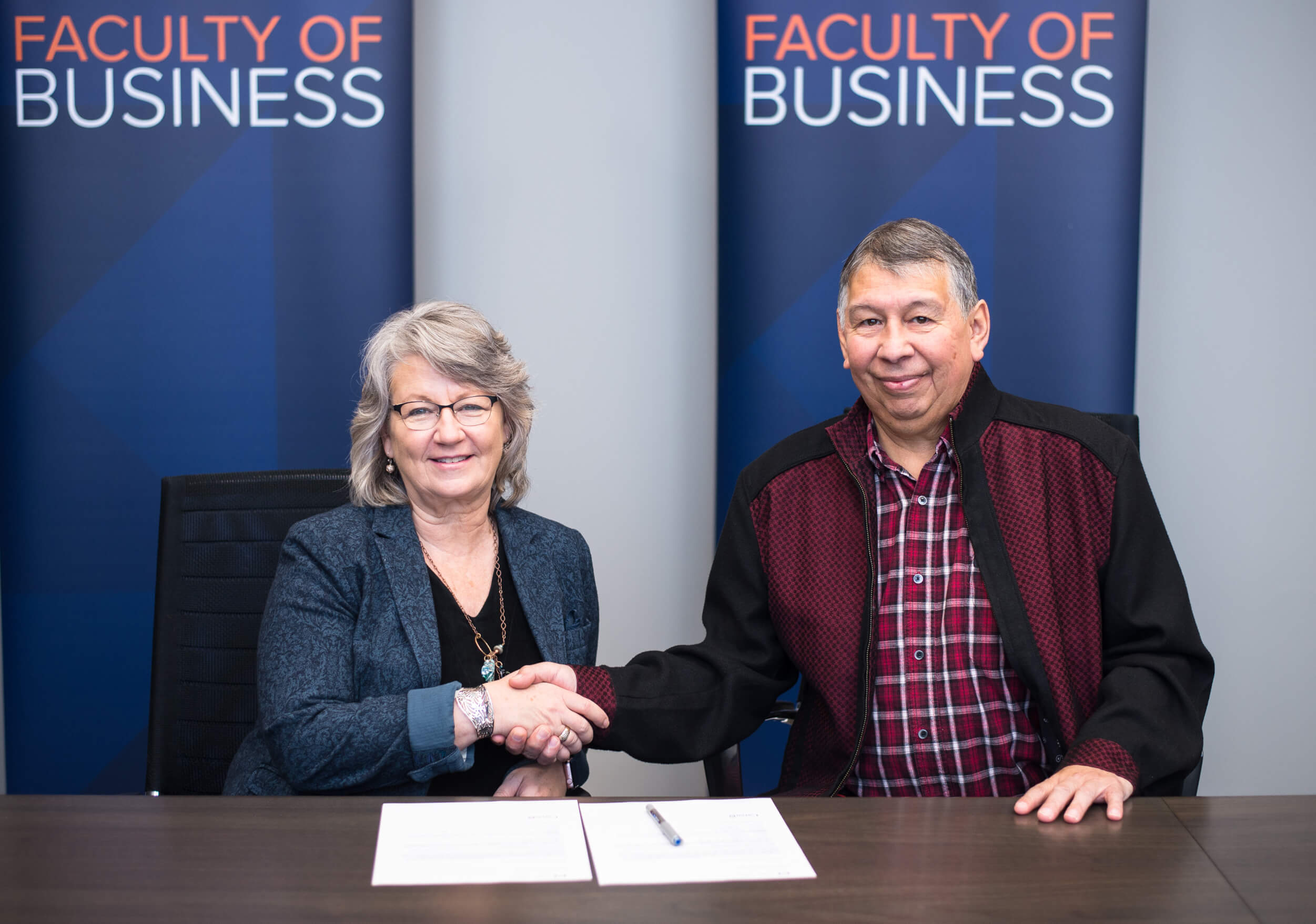 Dr. Deborah Hurst and Gerald Whitford at signing of partnership in October 2018
