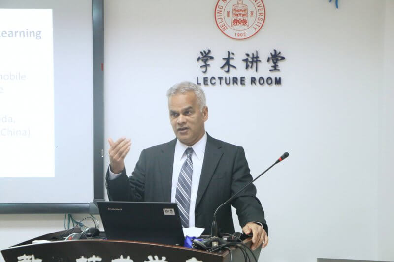 Dr. Mohamed Ally, an internationally respected scholar from Athabasca University, giving a presentation in China.
