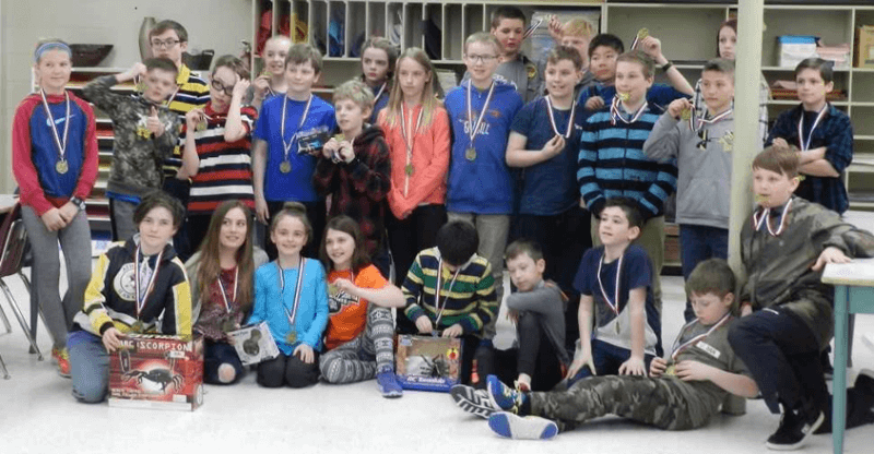 Some of the participants of a science fair at Landing Trail School. Science Outreach – Athabasca judged the projects and donated the prizes. Photo: Wayne Brehaut.