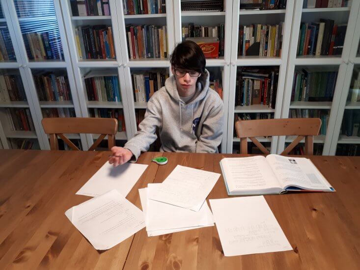 Jonny Aloni, 14, works on his university-level math courses at his home in Metro Vancouver.