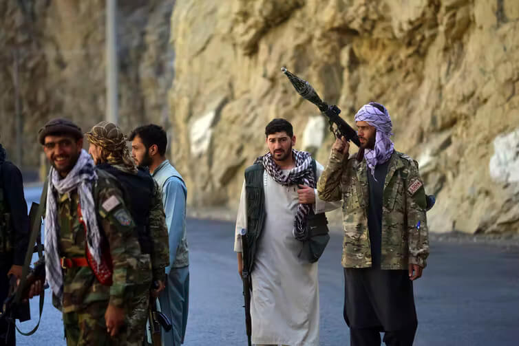 Militiamen loyal to Ahmad Massoud, the founder of the anti-Taliban National Resistance Front of Afghanistan, stand guard in Panjshir, the last region not under Taliban control following their stunning blitz across Afghanistan