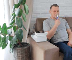 man with oxygen support at home