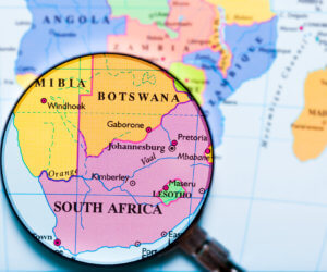 A map of southern African with a magnifying glass showing the location of Lesotho.
