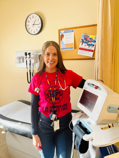 Athabasca University Master of Nursing – Nurse Practitioner grad Kayla Milley in an exam room in Fox Lake, Alberta.