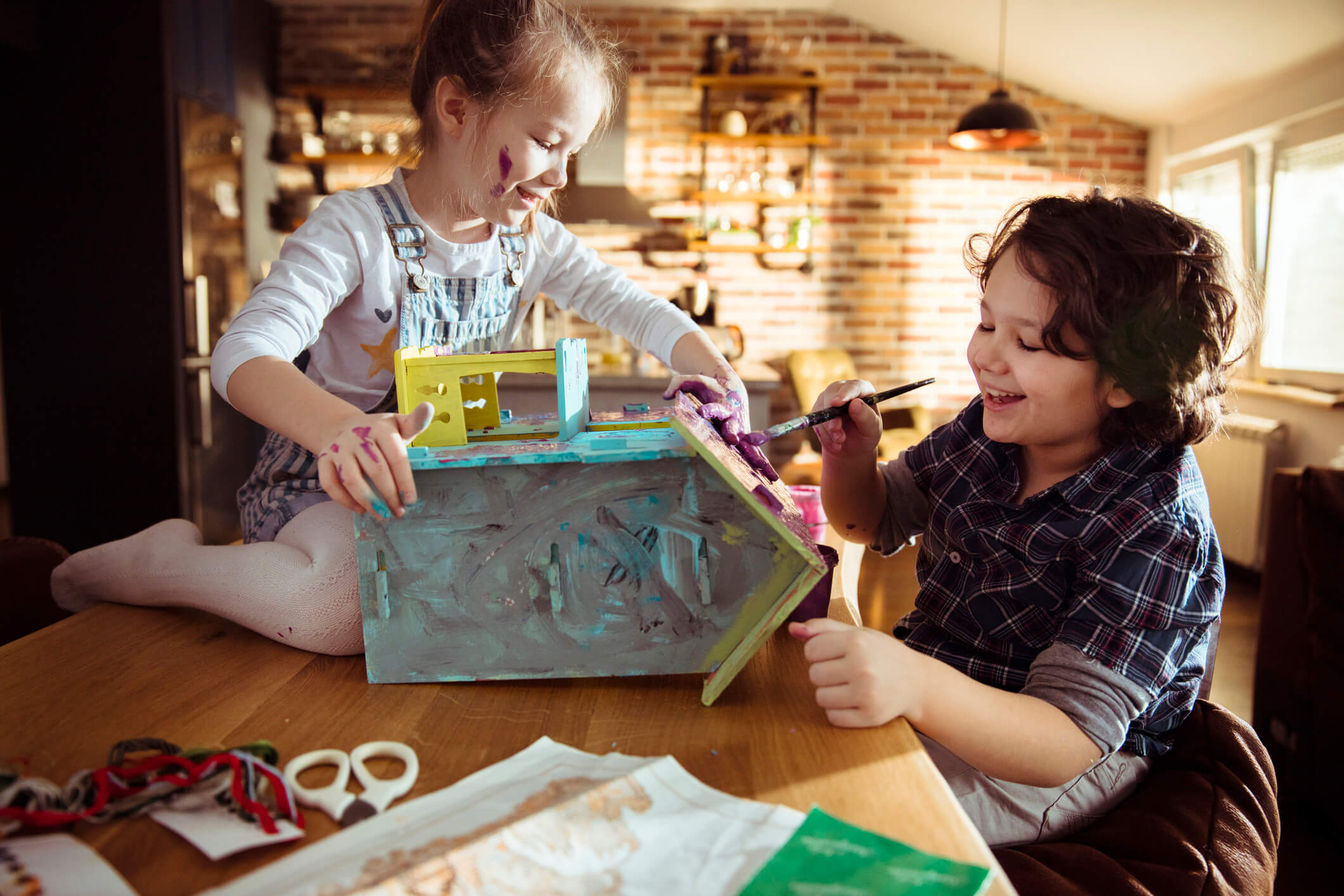 Doll House Children painting a doll house
