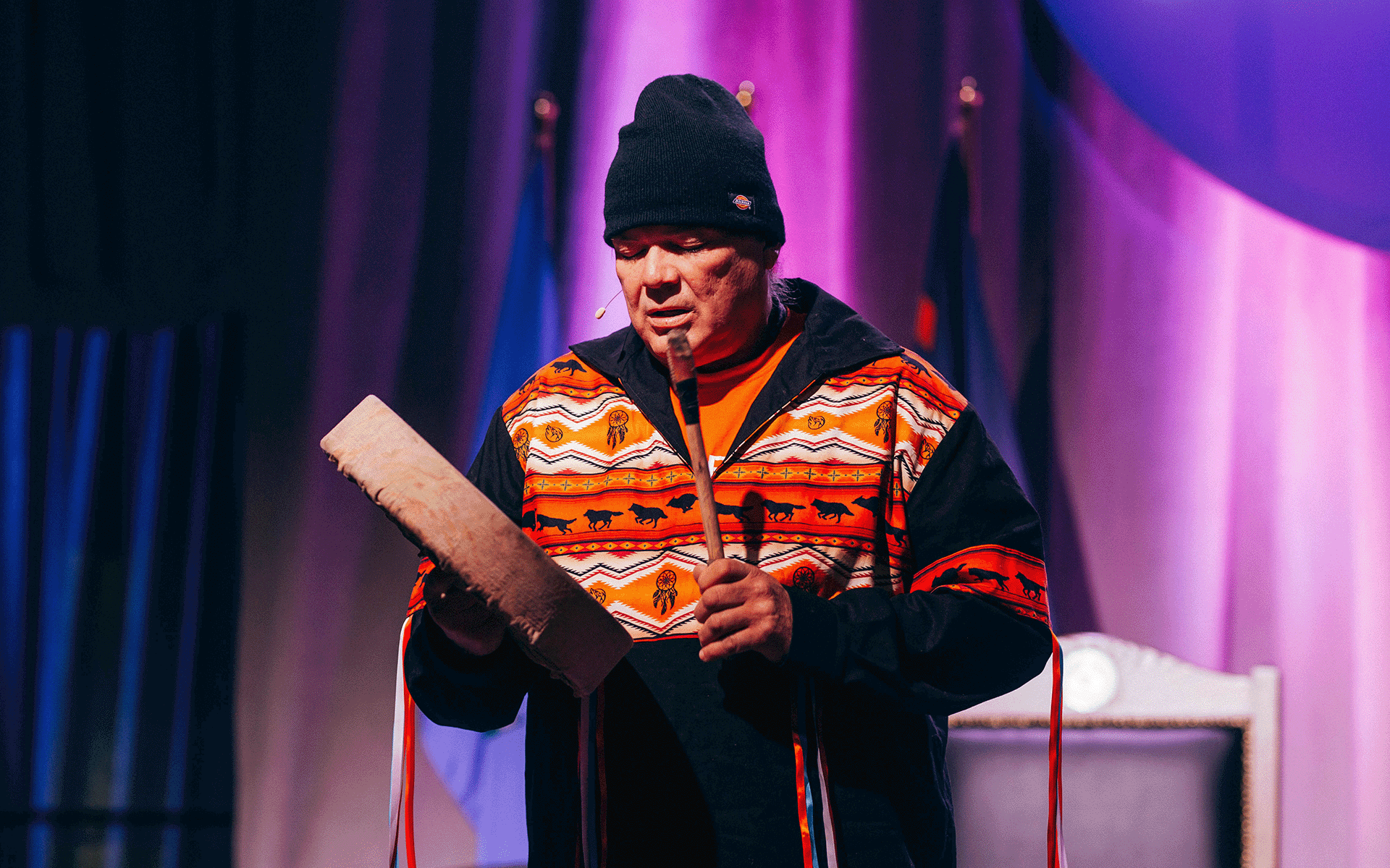 Brian Cardinal Image of man holding on to drum