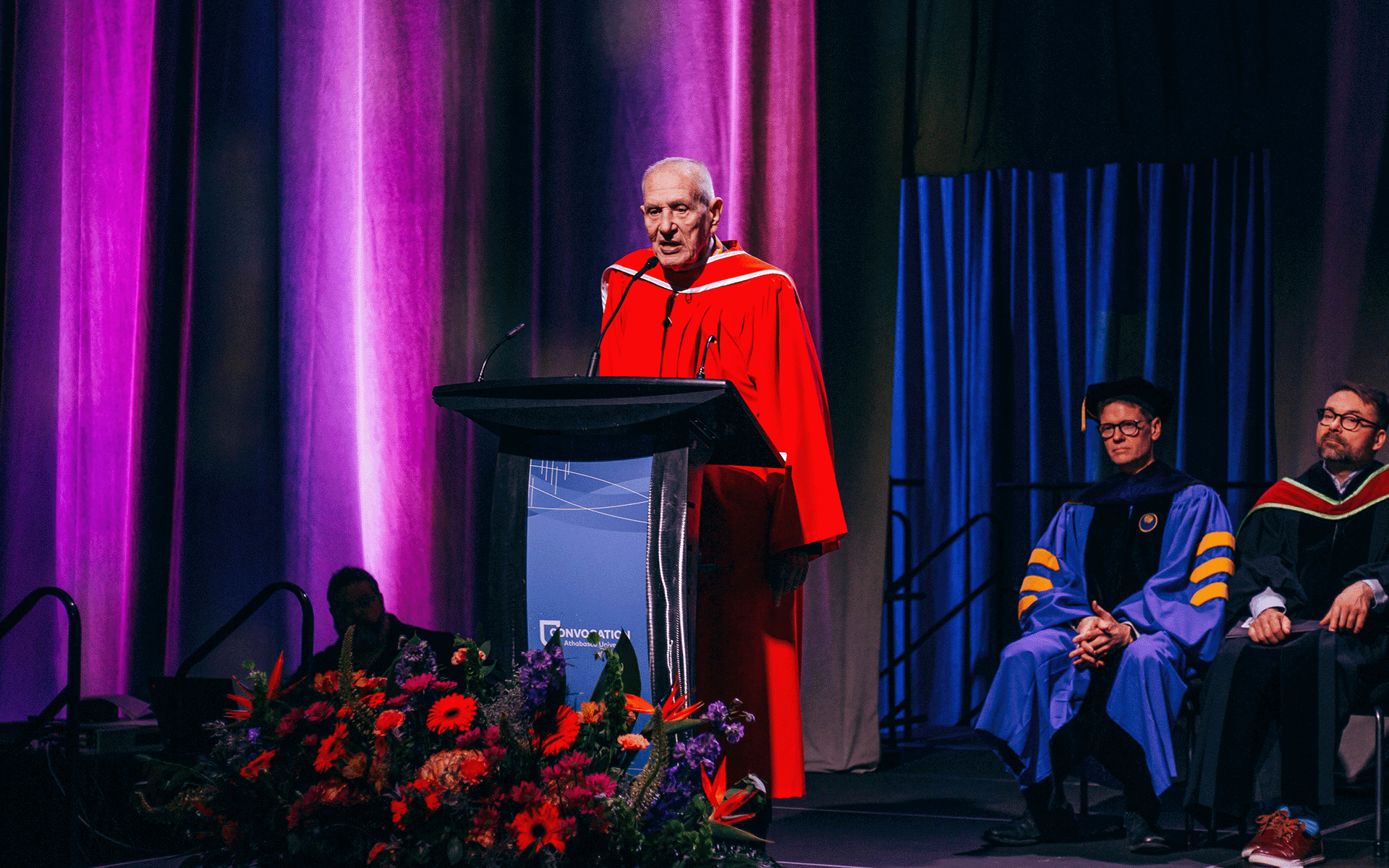 Douglas Cardinal Douglas J. Cardinal receiving Honorary Doctor of Laws, image is focused on older man standing at the podium