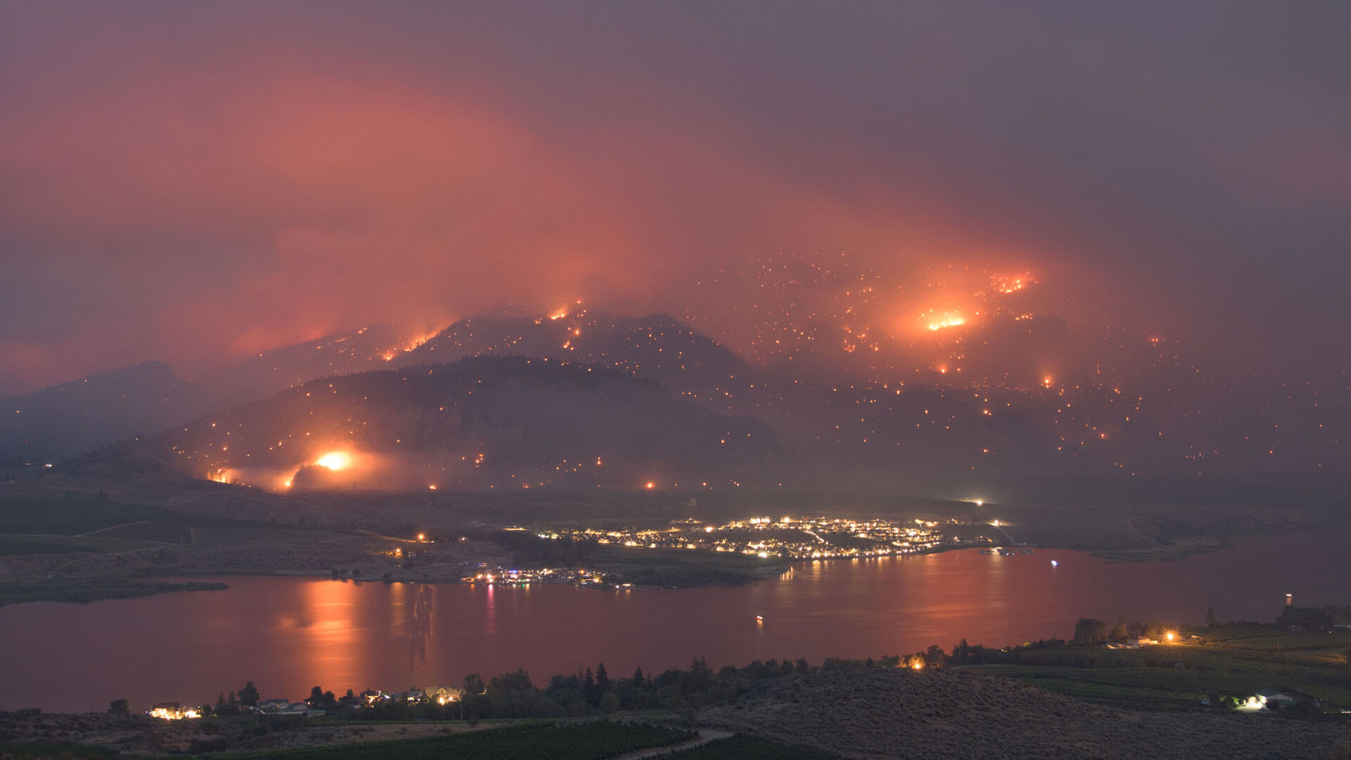 Wildfire-Osoyoos-1920-1080 Wildfire burning near Osoyoos at night time.